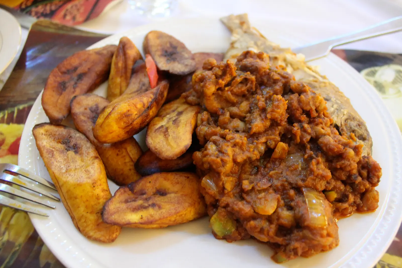 Ghanaian red-red, a black-eyed pea stew cooked in red palm oil, served with fried plantain and fish